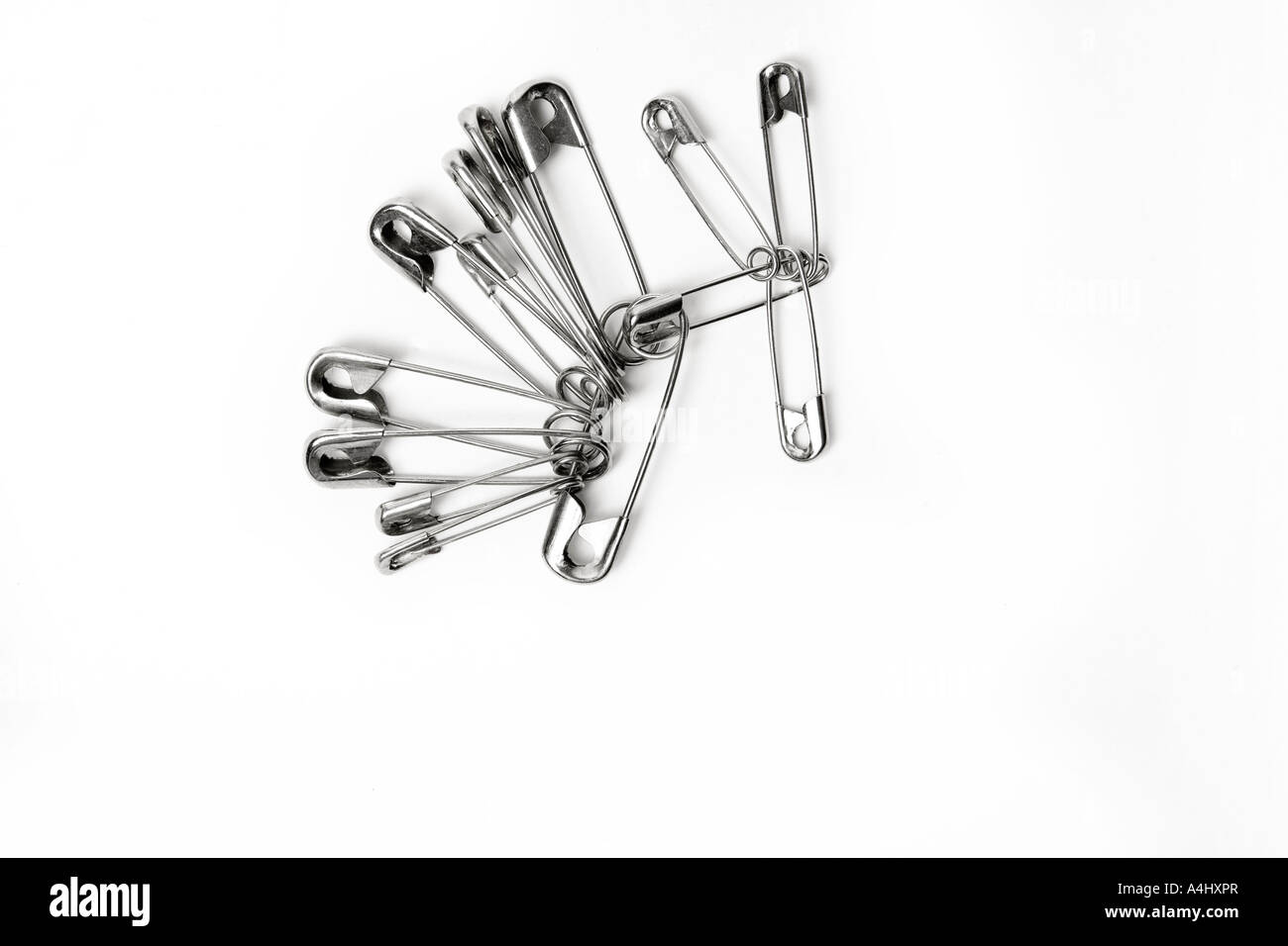 Different sized safety pins Stock Photo Alamy