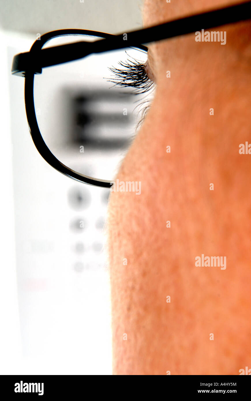 woman reading eye test chart Stock Photo - Alamy