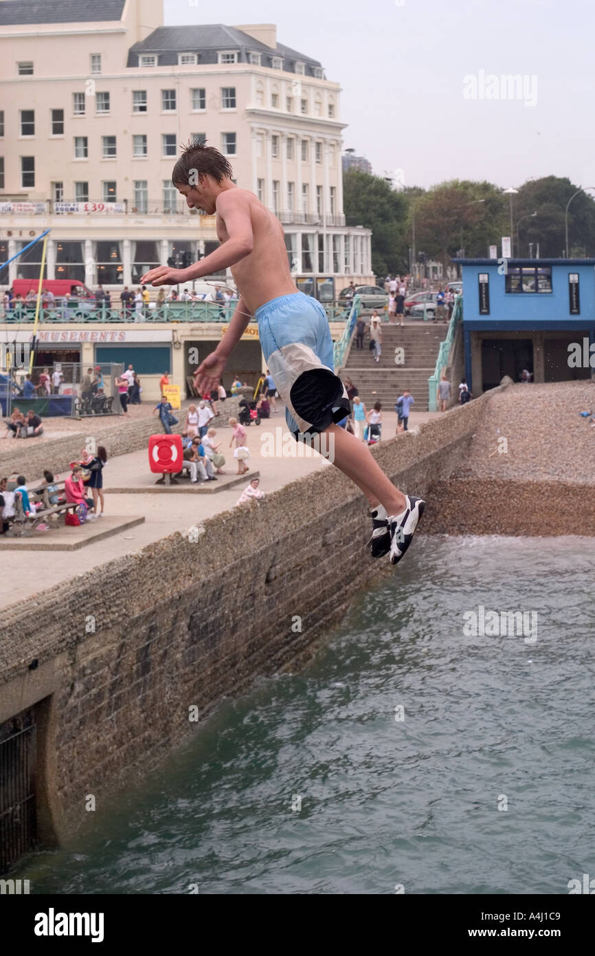 Boy jumping off pier hires stock photography and images Alamy