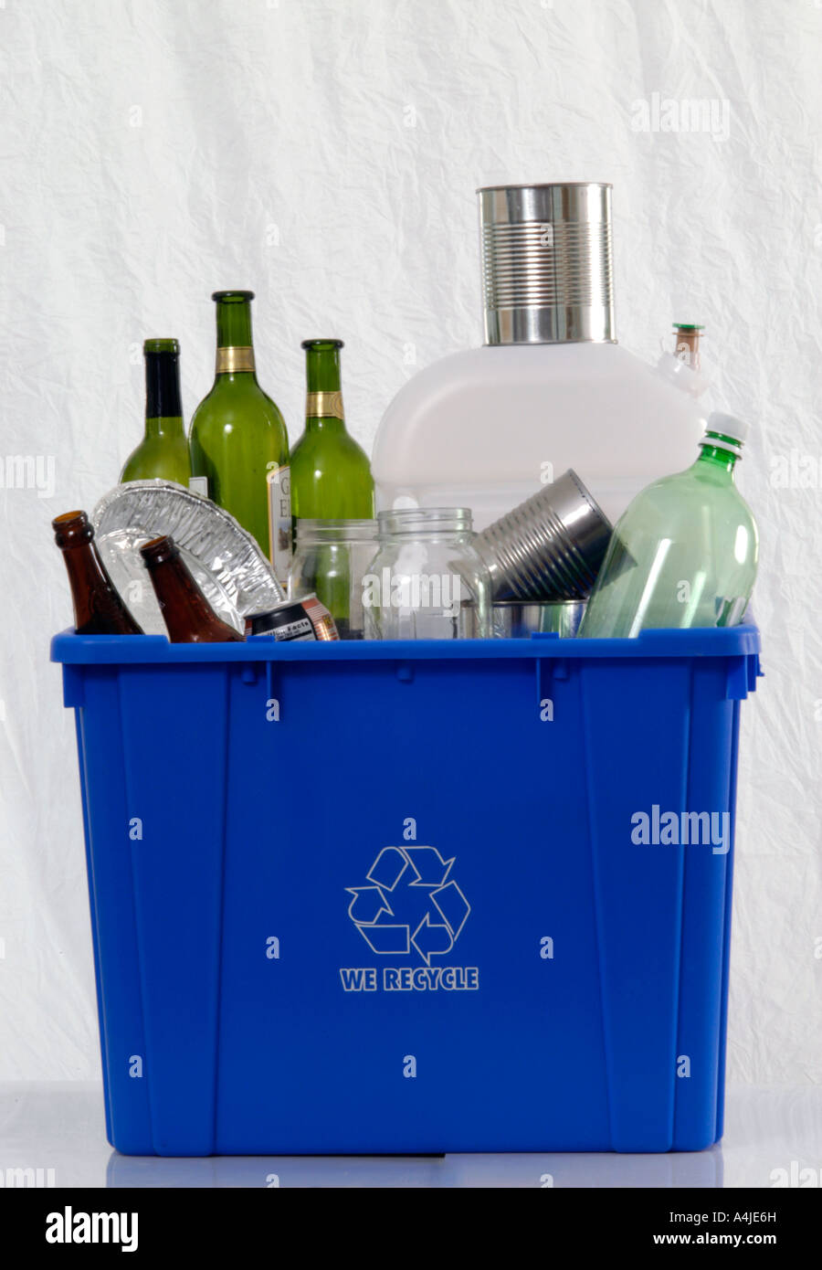 Recycle Container filled with Bottles, Cans, Jars and Plastic Stock