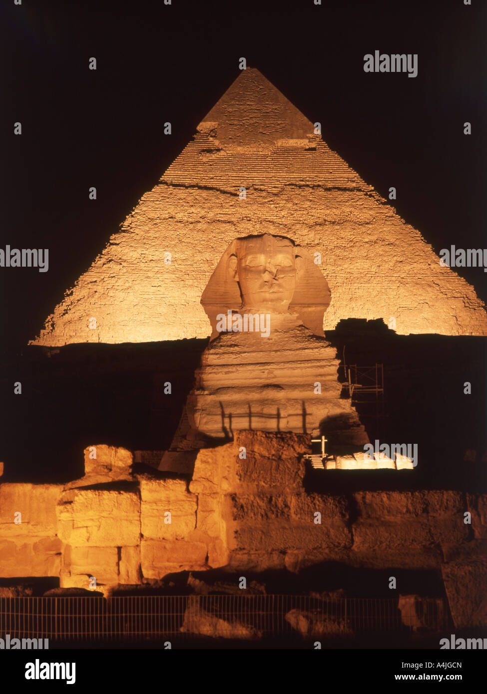 The ancient Pyramid of Khafre and The Great Sphinx of Giza at night, Giza, Giza Governate, Republic of Egypt Stock Photo