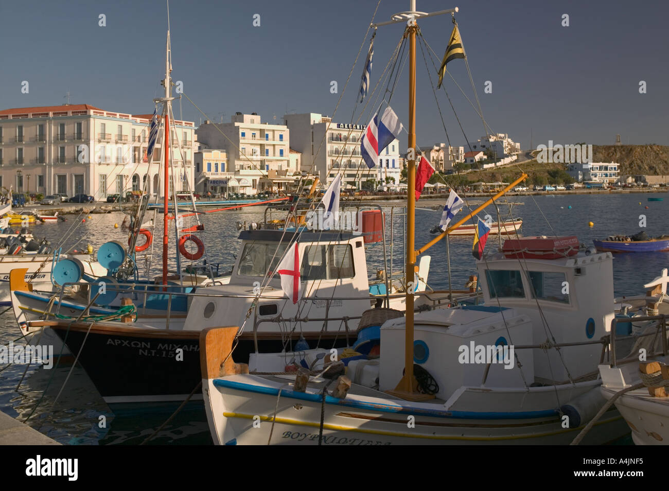 Fishing boats in Tinos Town in the Greek Islands. Stock Photo