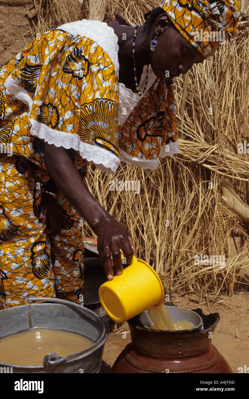 Filtering Water to Eliminate Cyclopods, Niger. Stock Photo