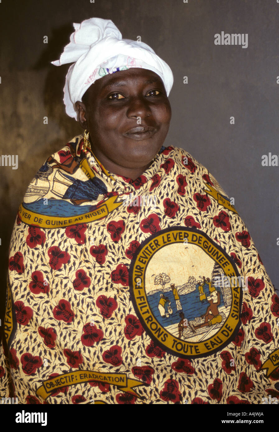 Woman's Fabric Carries Guinea Worm Eradication Message, Niger. Stock Photo