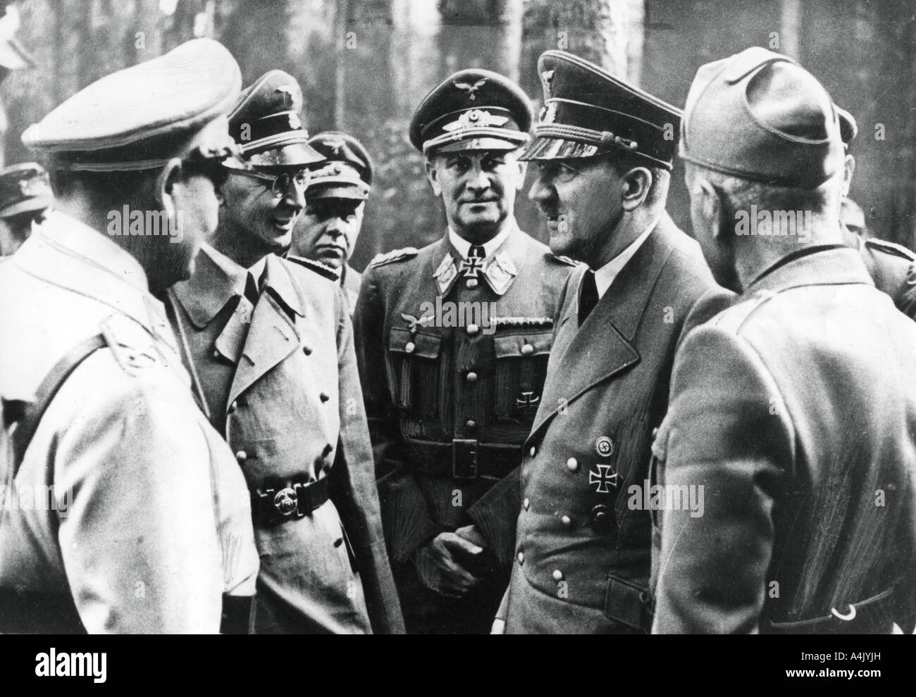 Adolf Hitler with Benito Mussoloni and senior Nazis, 1944. Artist: Unknown Stock Photo