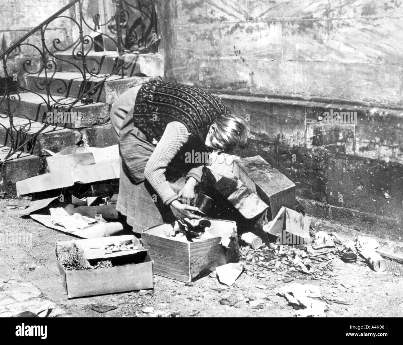 Woman scavenging for food, Bayreuth, Germany, April 1945. Artist: Unknown Stock Photo
