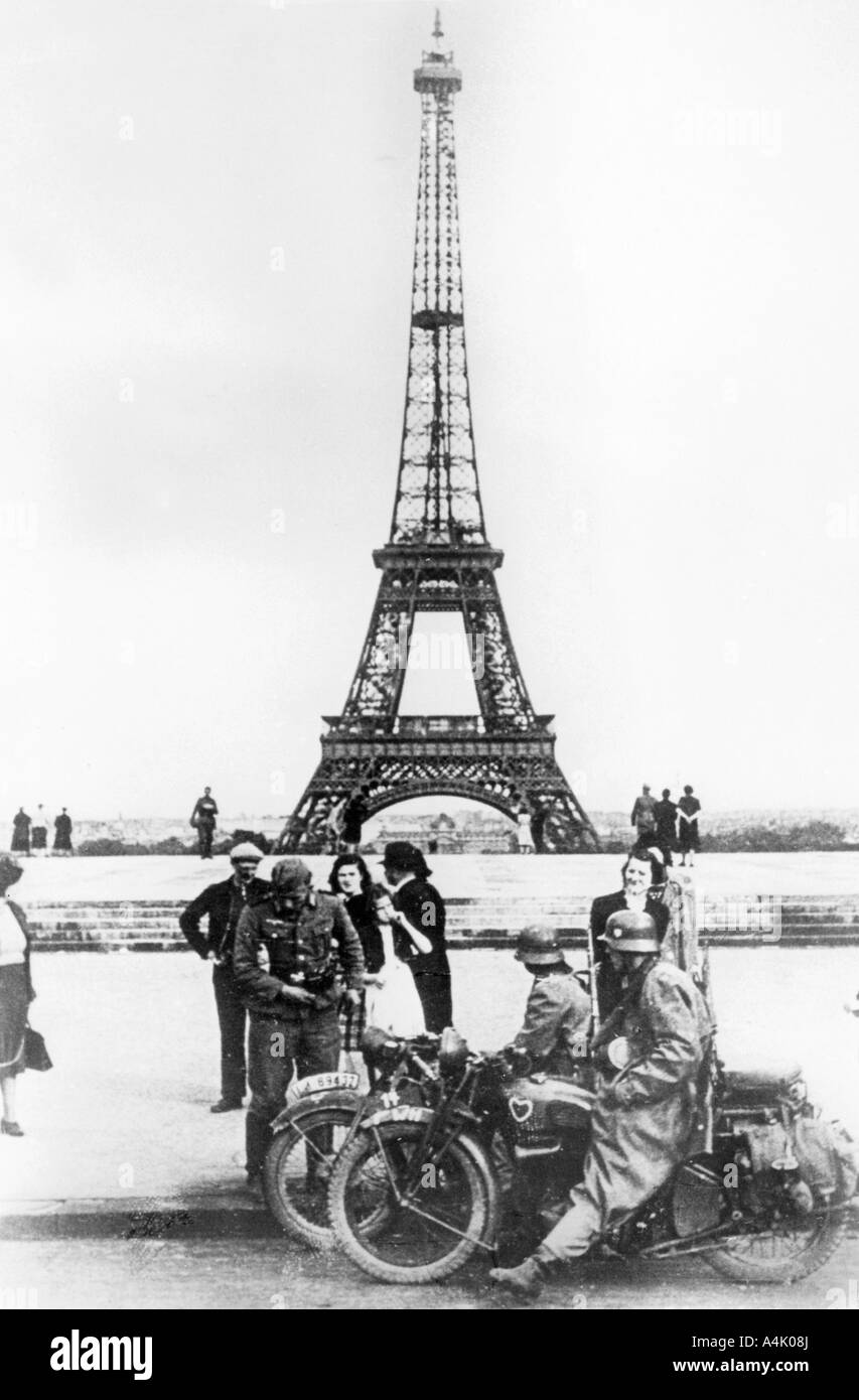 German soldiers in front of the Eiffel Tower, Paris, 1940. Artist: Unknown Stock Photo