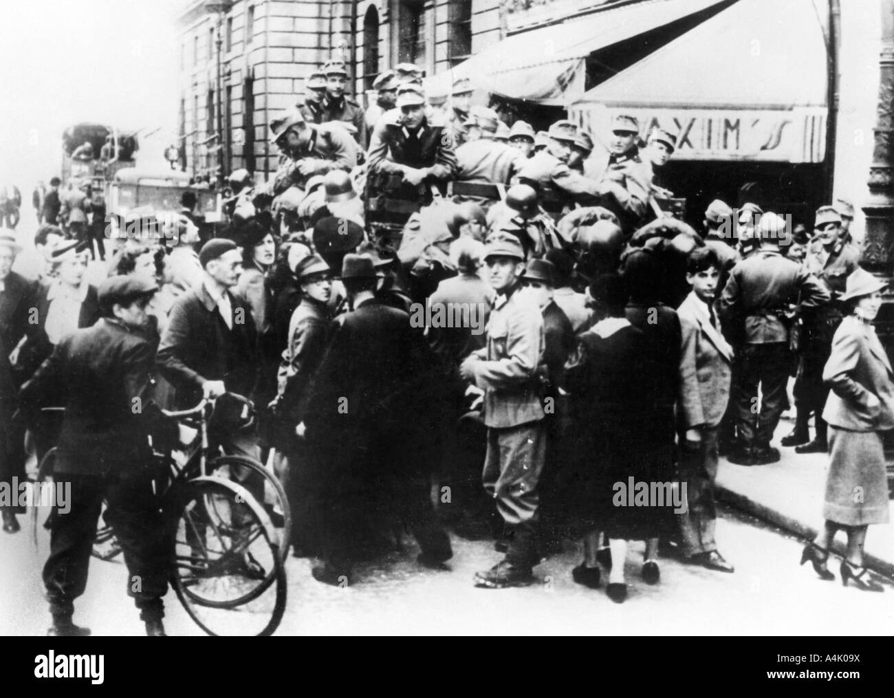 German soldiers outside Maxim's restaurant, Paris, July 1940. Artist: Unknown Stock Photo