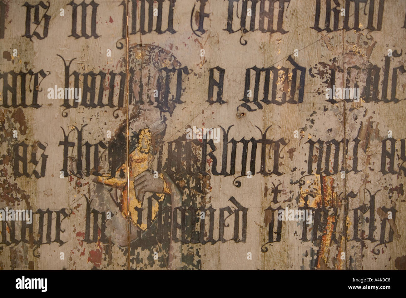 ancient text on a rude screen in Binham priory Stock Photo