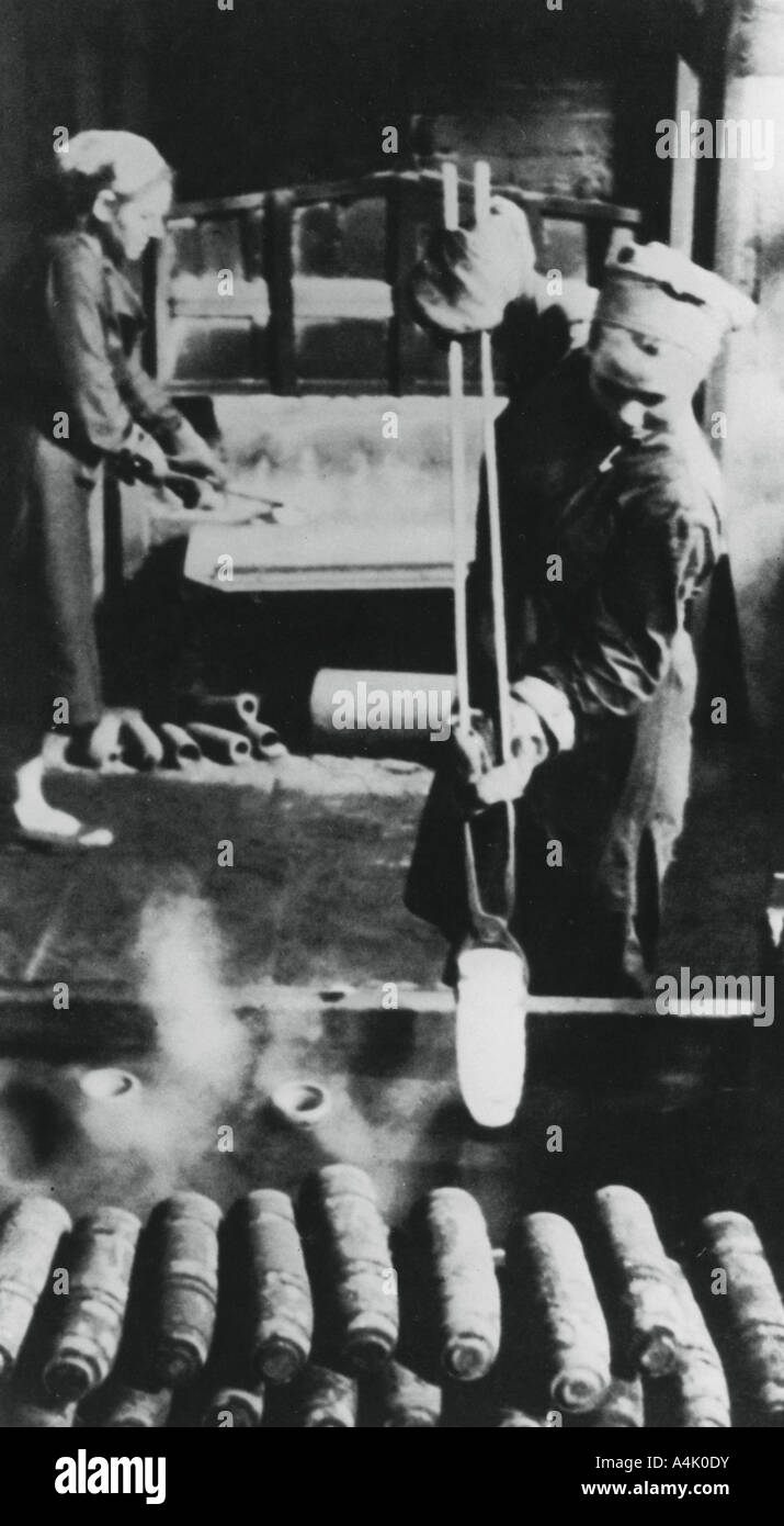 Women manufacturing shell casings in a Russian factory, World War II, 1943. Artist: Unknown Stock Photo