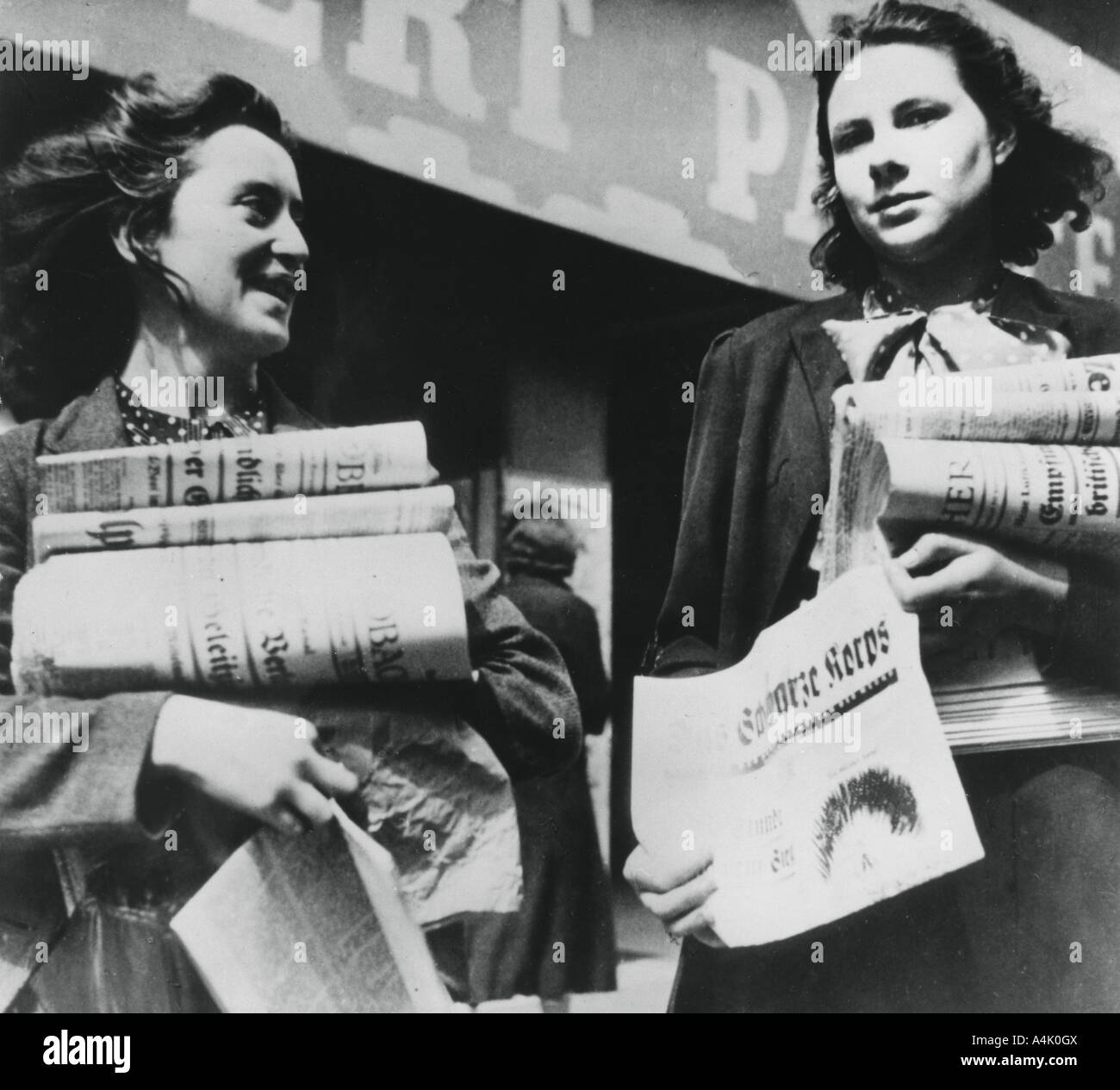 Women selling German newspapers, German-occupied Paris, 19 July 1940. Artist: Unknown Stock Photo