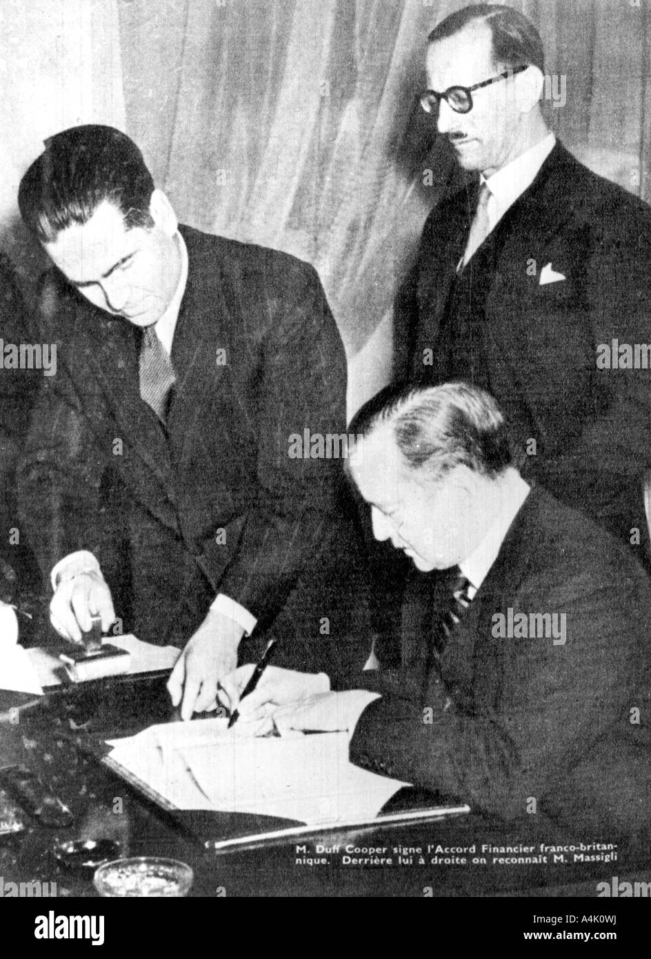 Signing of financial accord between Britain and the Free French, Algiers, 8 February 1944. Artist: Unknown Stock Photo