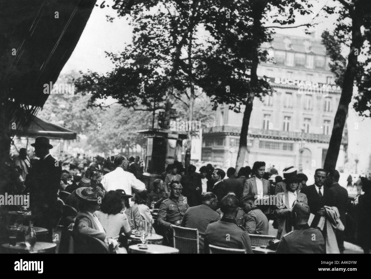 German army officers relaxing outside the Cafe de la Paix, Paris, June 1940. Artist: Unknown Stock Photo