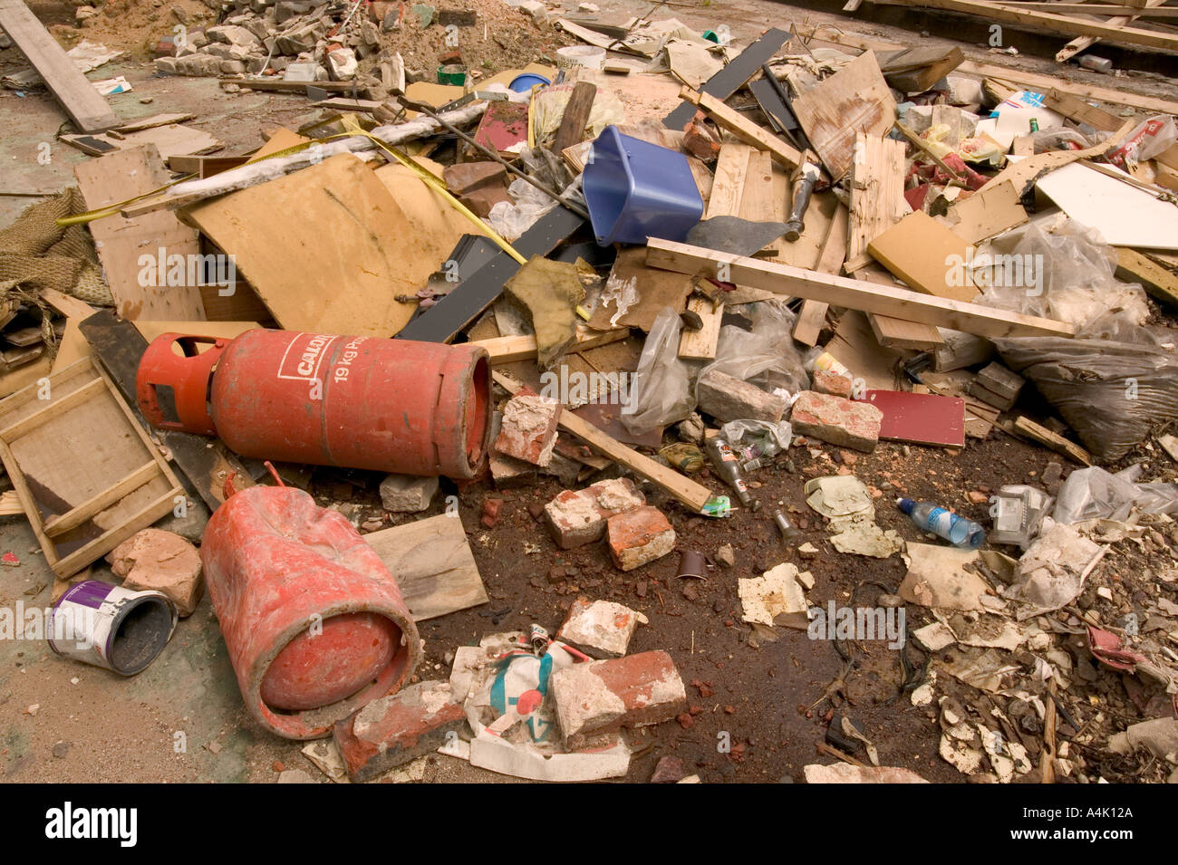 illegally dumped rubbish on waste ground in preston Stock Photo Alamy