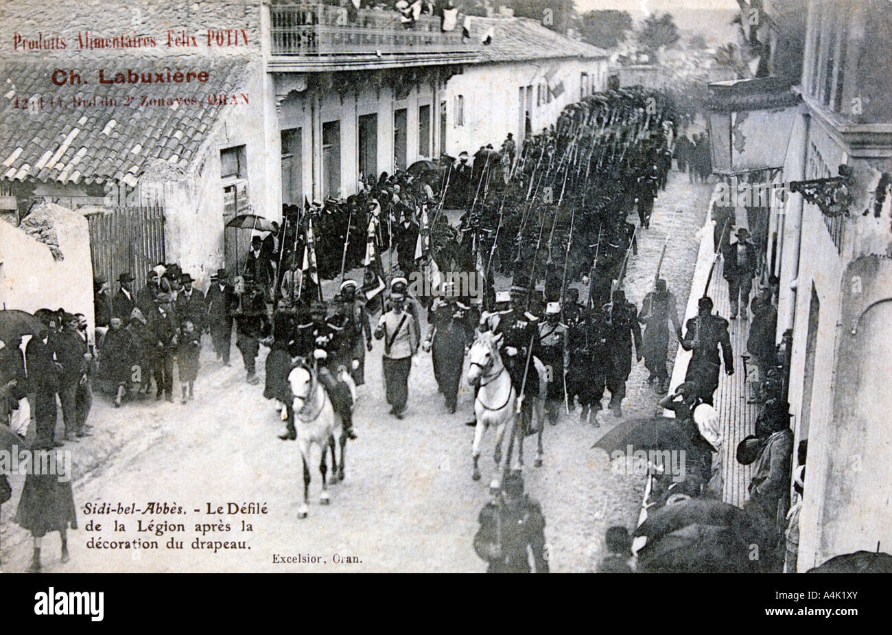 The French Foreign Legion parading through the streets of Sidi Bel Abbes, Algeria, 1906. Artist: Unknown Stock Photo