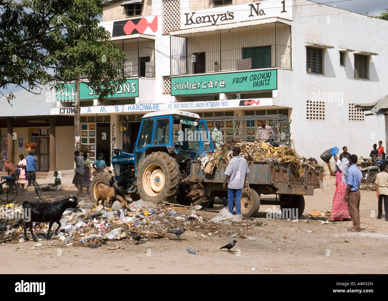 Workers collecting garbage in Mtwapa, Kenya Stock Photo