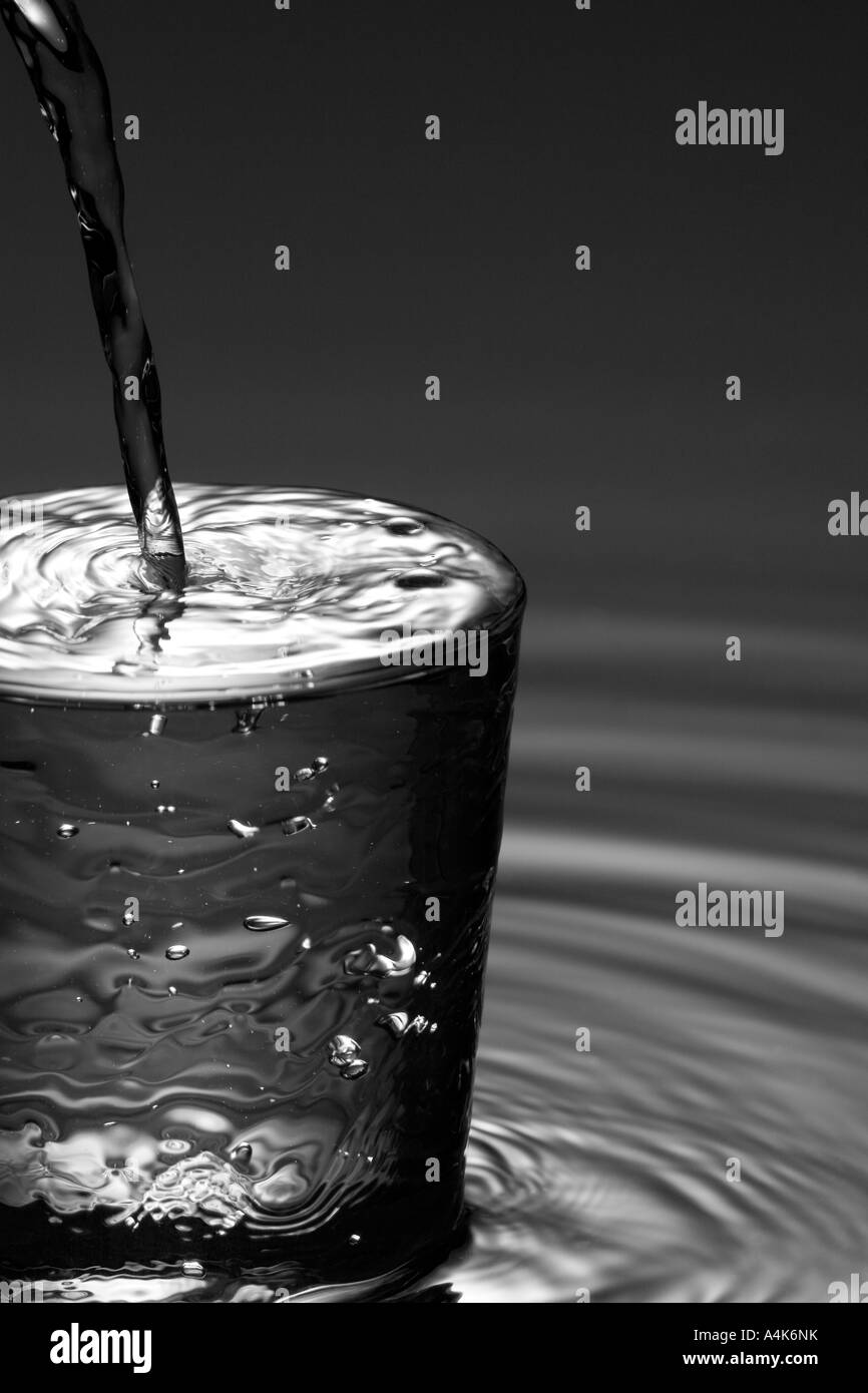 Water Pouring into Glass Stock Photo Alamy