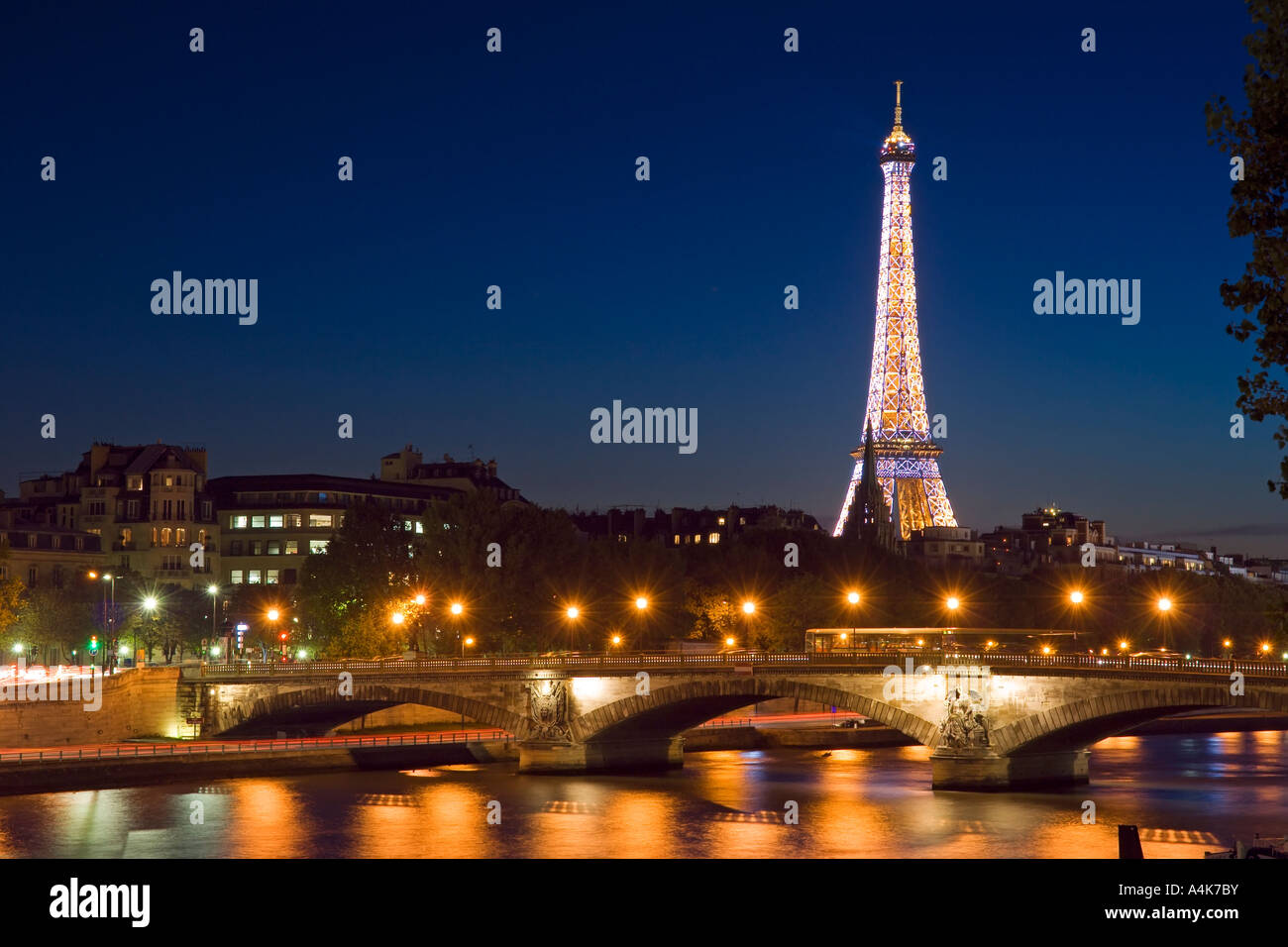 Parisian cityscape with the Eiffel tower at night - Paris, France Stock ...