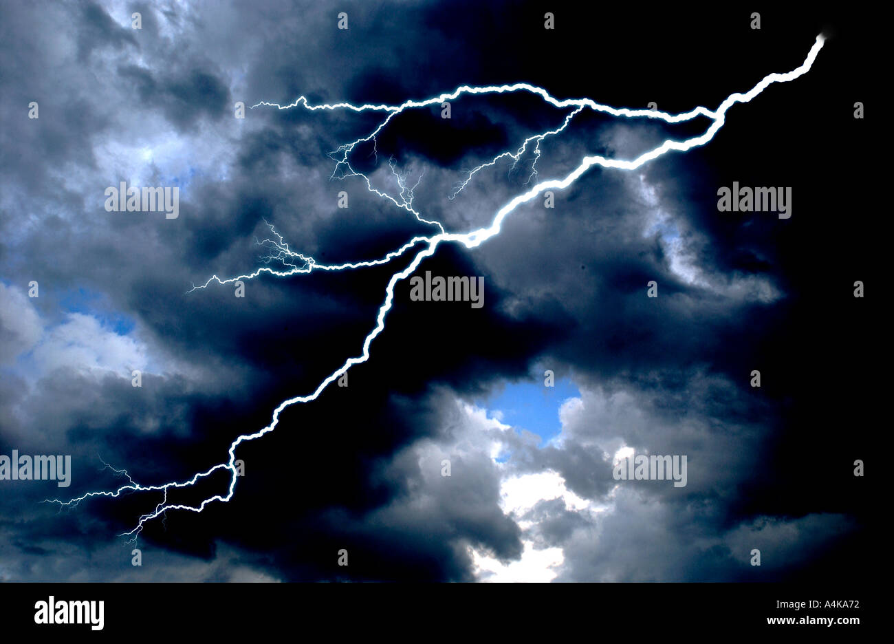 Lightning bolts across stormy sky Stock Photo - Alamy