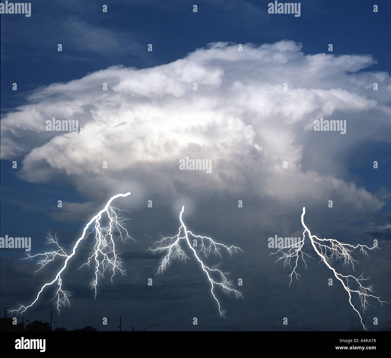 Lightning bolts across stormy sky Stock Photo - Alamy