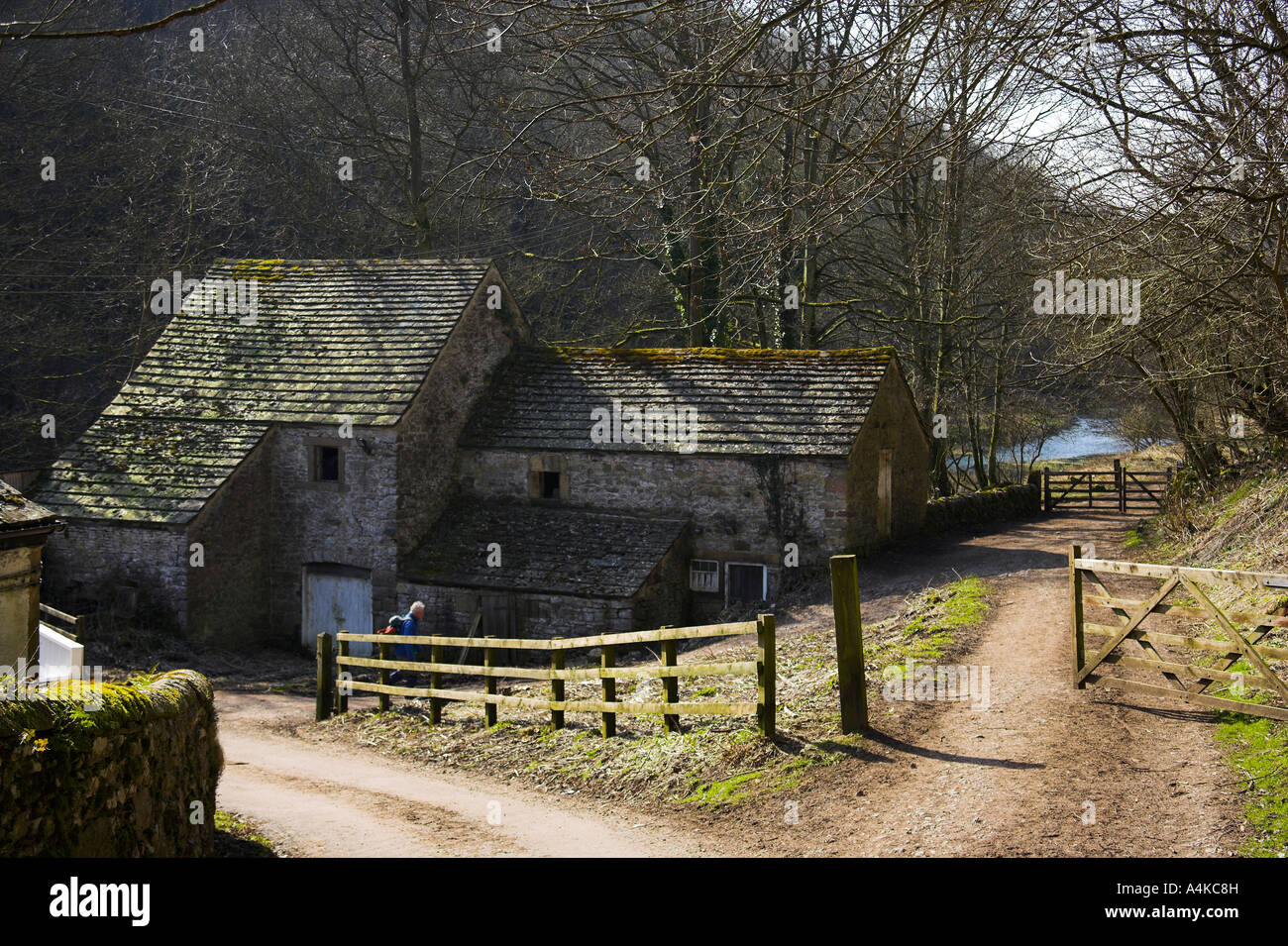 Farm Buildings in  Lathkill Dale alongside the River Lathkill in the White Peak in Derbyshire Stock Photo