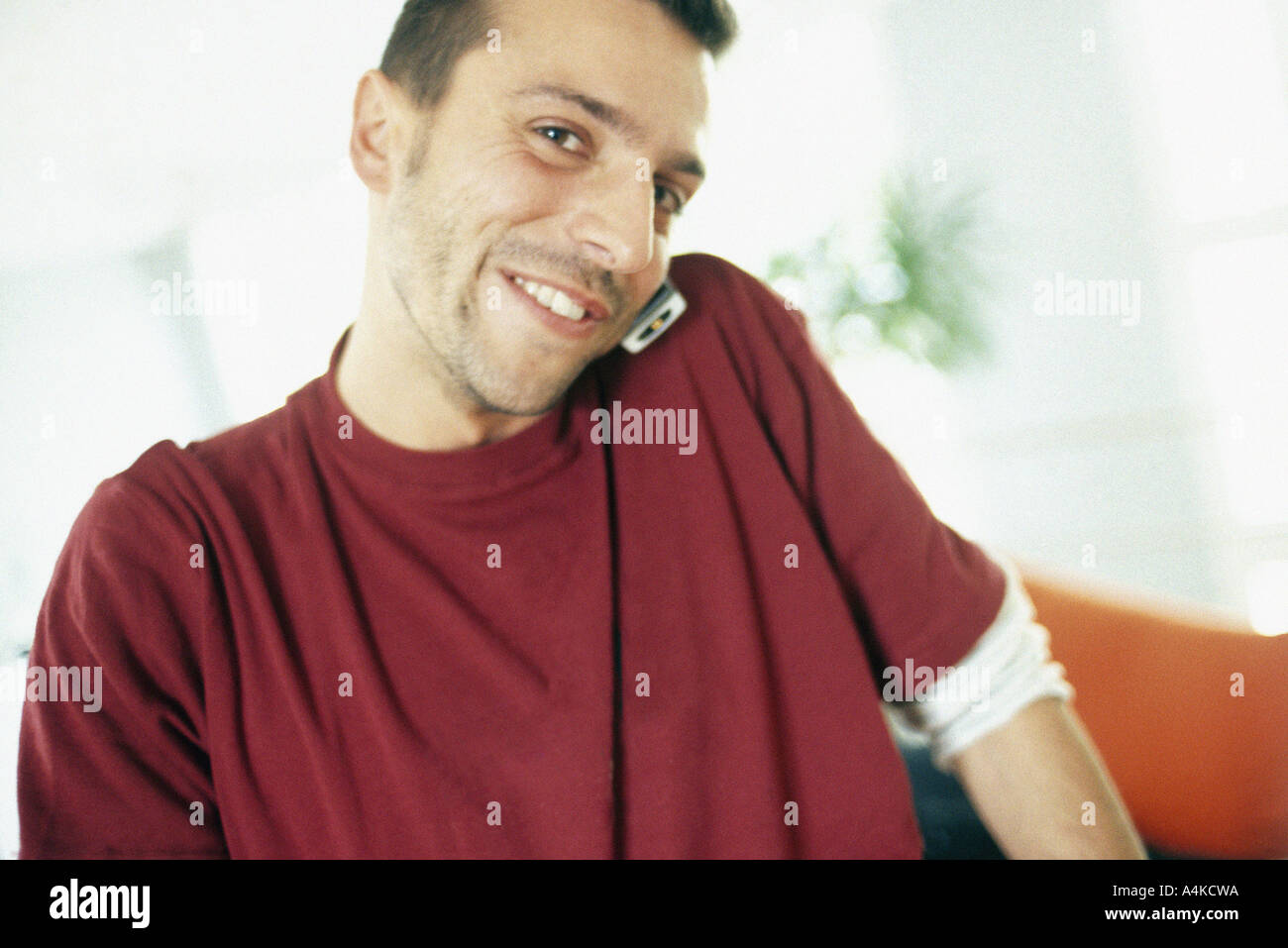 Man using cell phone Stock Photo