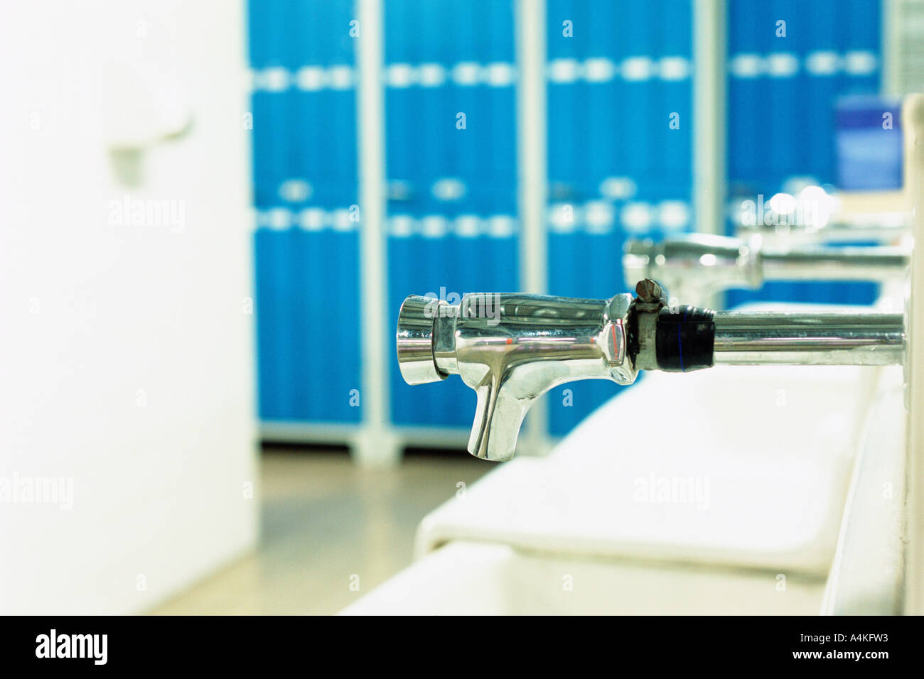 Sinks in locker room Stock Photo