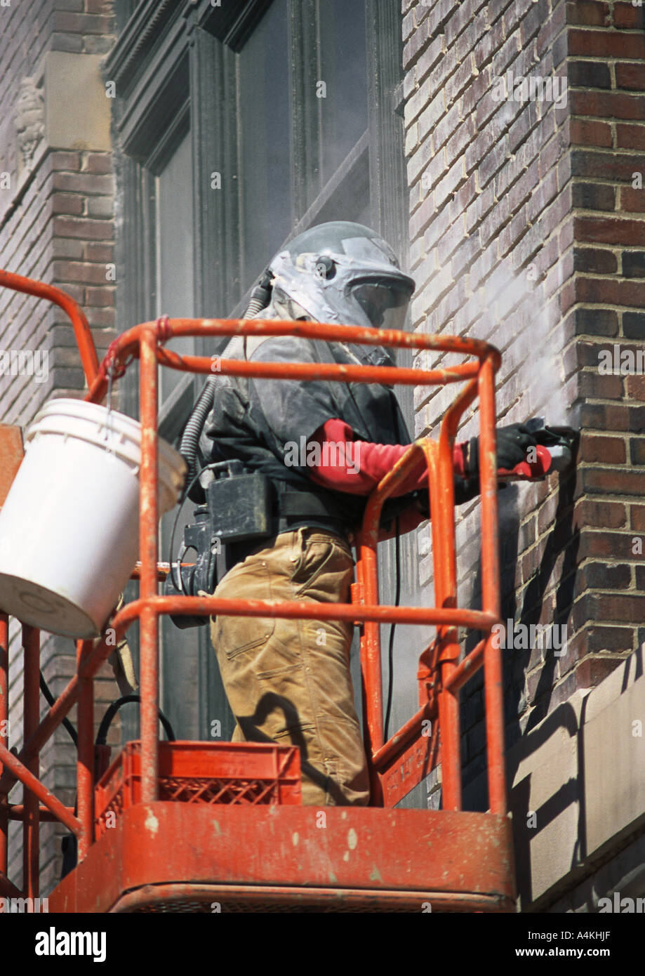 Wall washer on scaffold Stock Photo