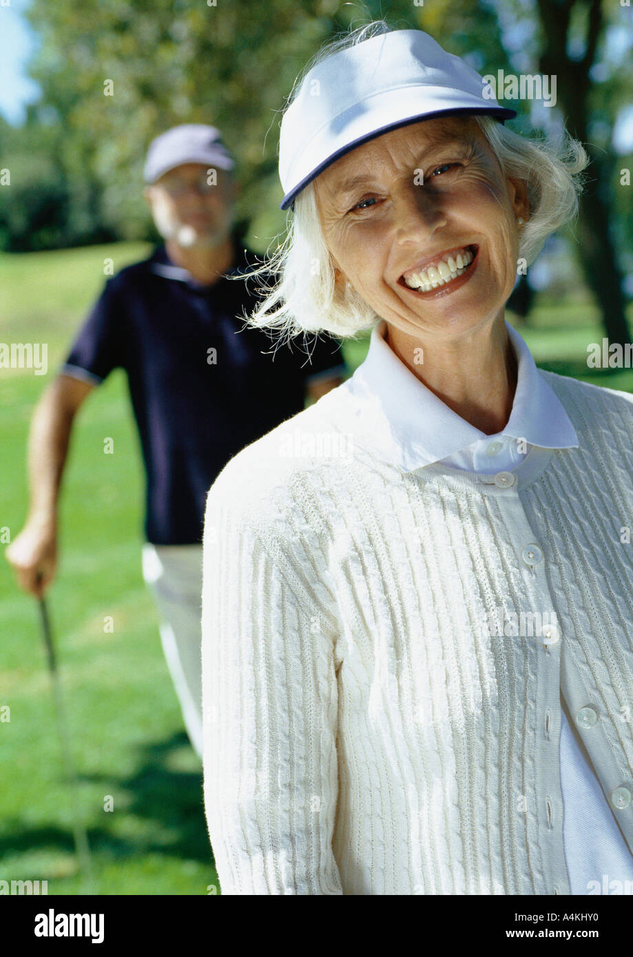 Mature couple playing golf Stock Photo