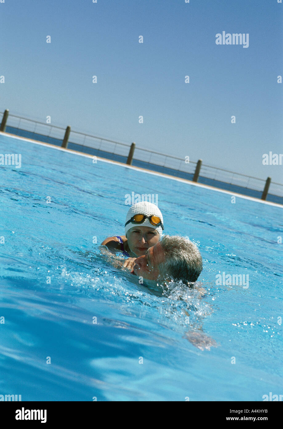 Mature couple in pool Stock Photo