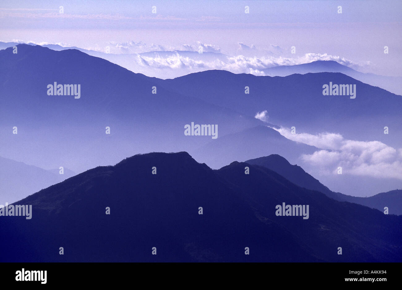 Hazy mountain views taken from the Hinku Valley in the Himalaya Nepal Stock Photo