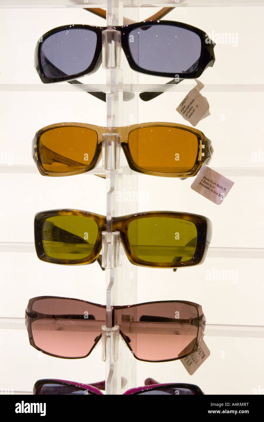Sunglasses on display rack Stock Photo Alamy