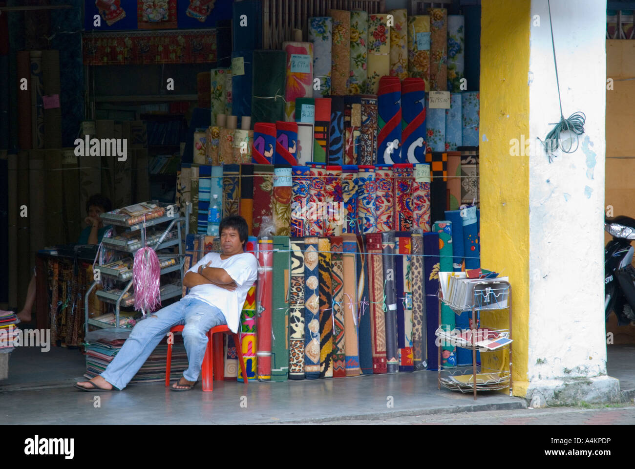 Carpet and rug salesman Johor Bahru Malaysia Stock Photo Alamy