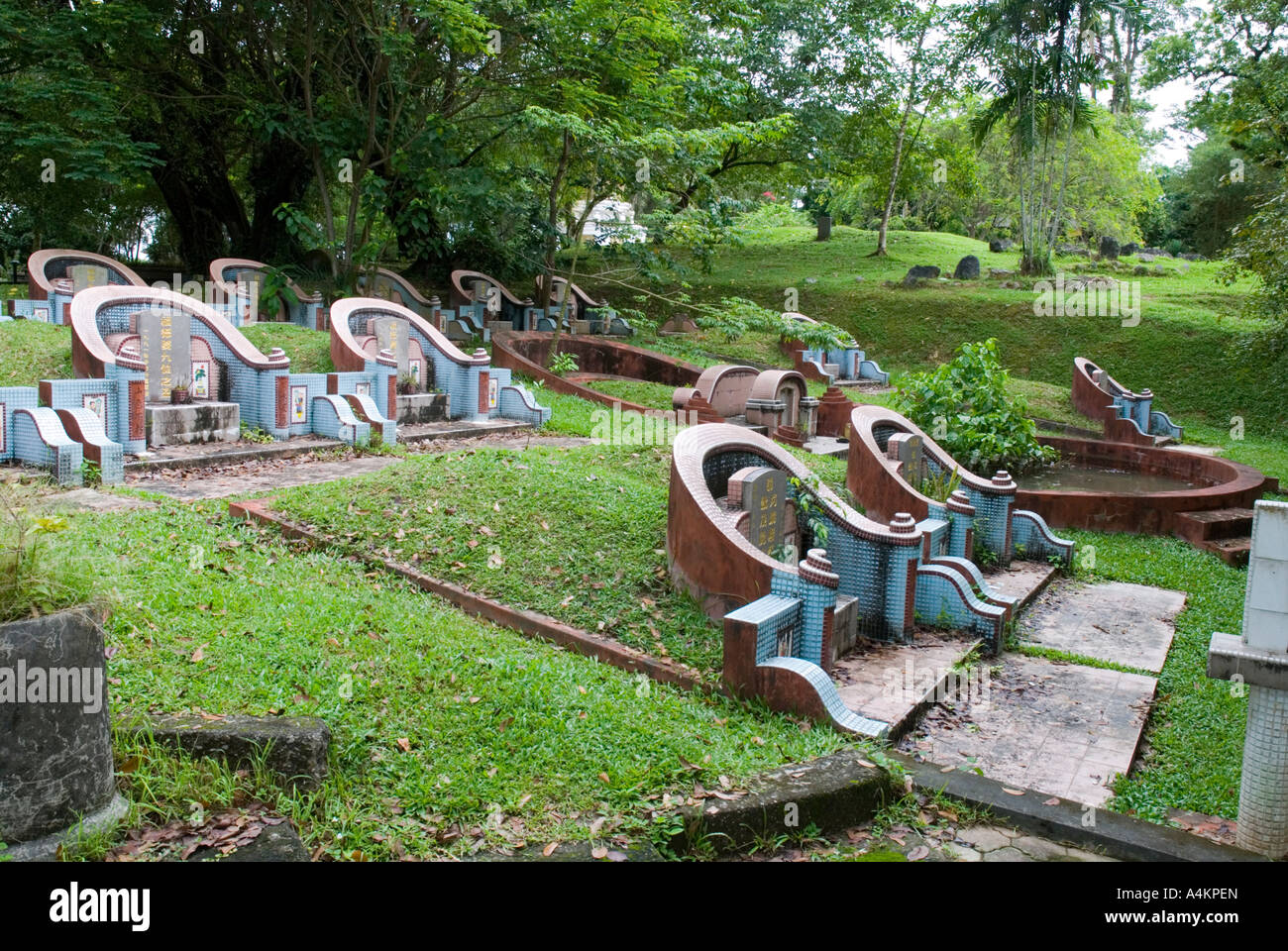 A well tended Chinese cemetery in a park in Kuching city, Sarawak Stock Photo