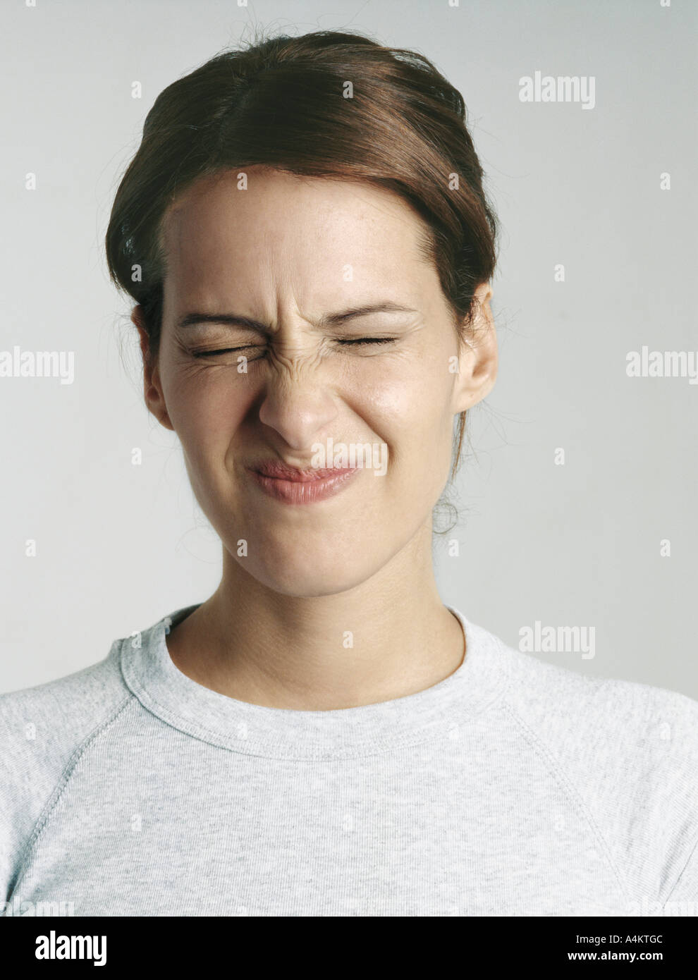 Squeezing eyes shut hires stock photography and images Alamy