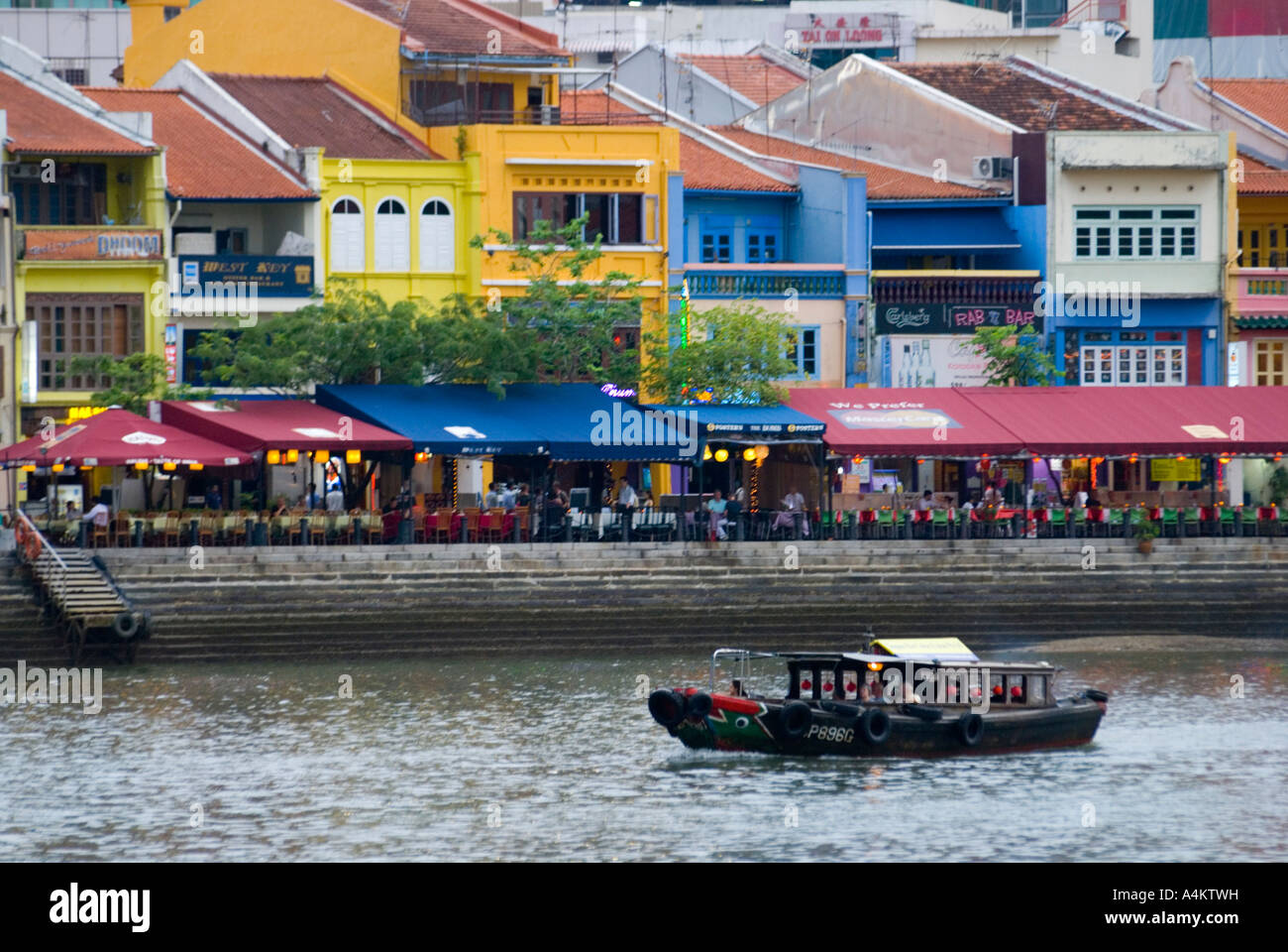 Restored shop houses along the waterfront at Boat Quay in Singapore Stock Photo