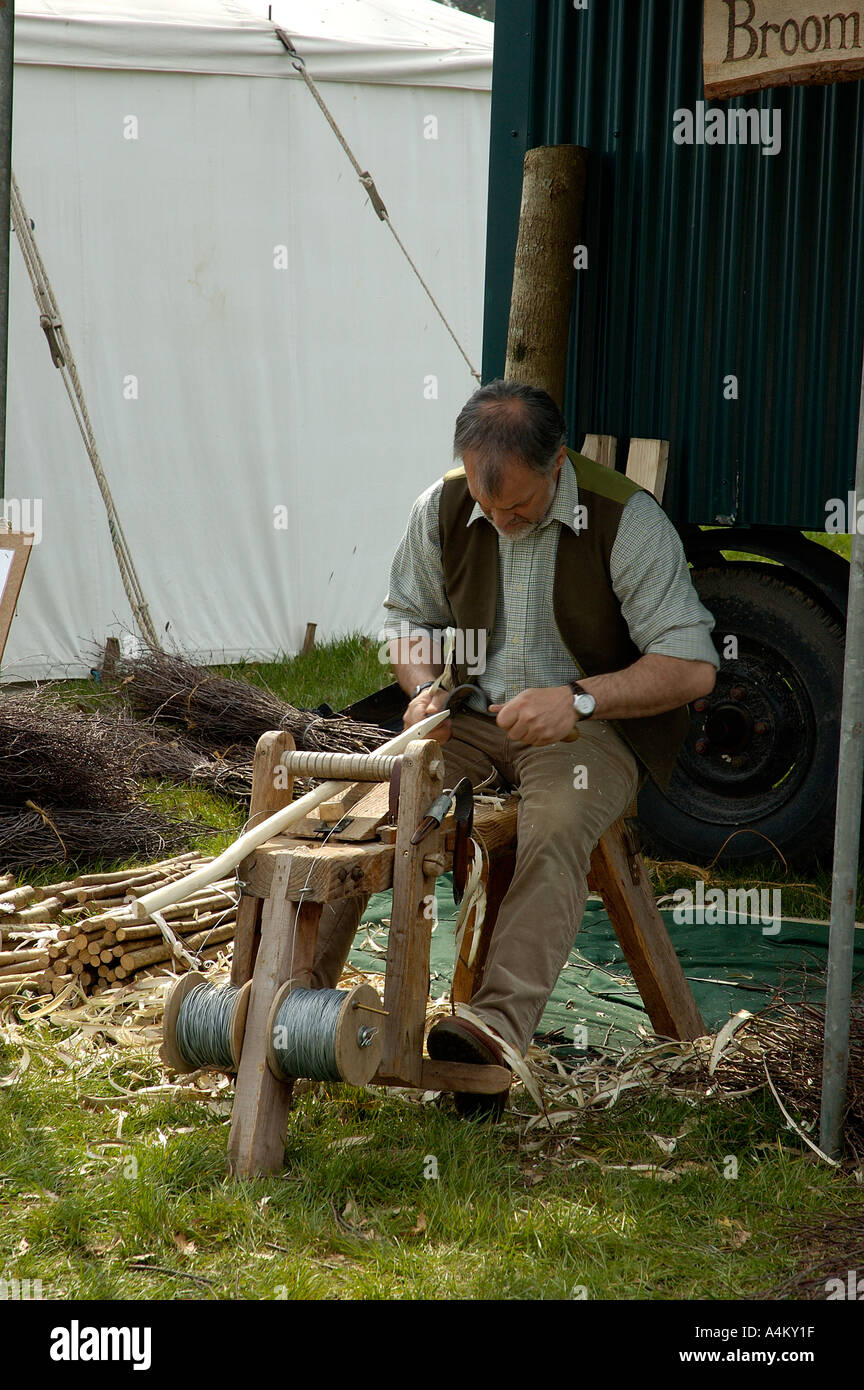 Man with Wood craft device at craft fair in Hampshire England UK United ...