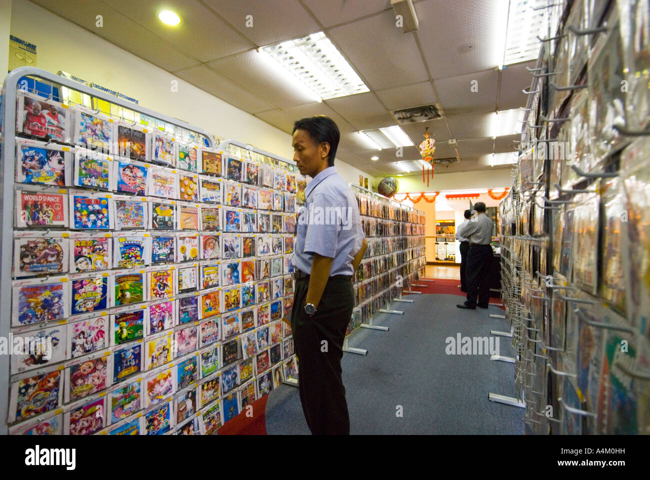 Pirate software and CDs openly on sale in a store in a large shopping