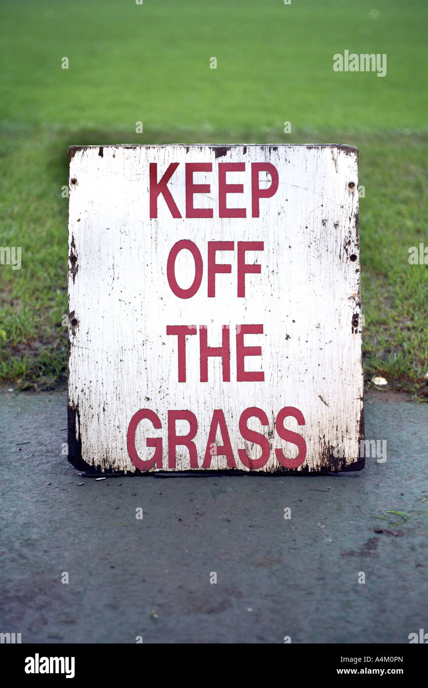 keep off the grass signage at Kettering football ground Stock Photo