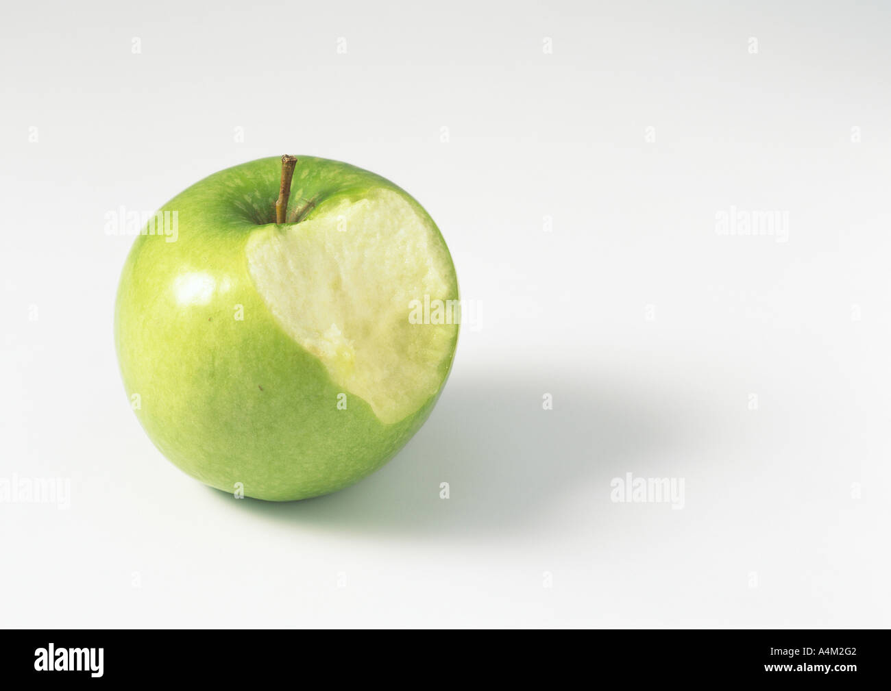 Apple with bite missing Stock Photo