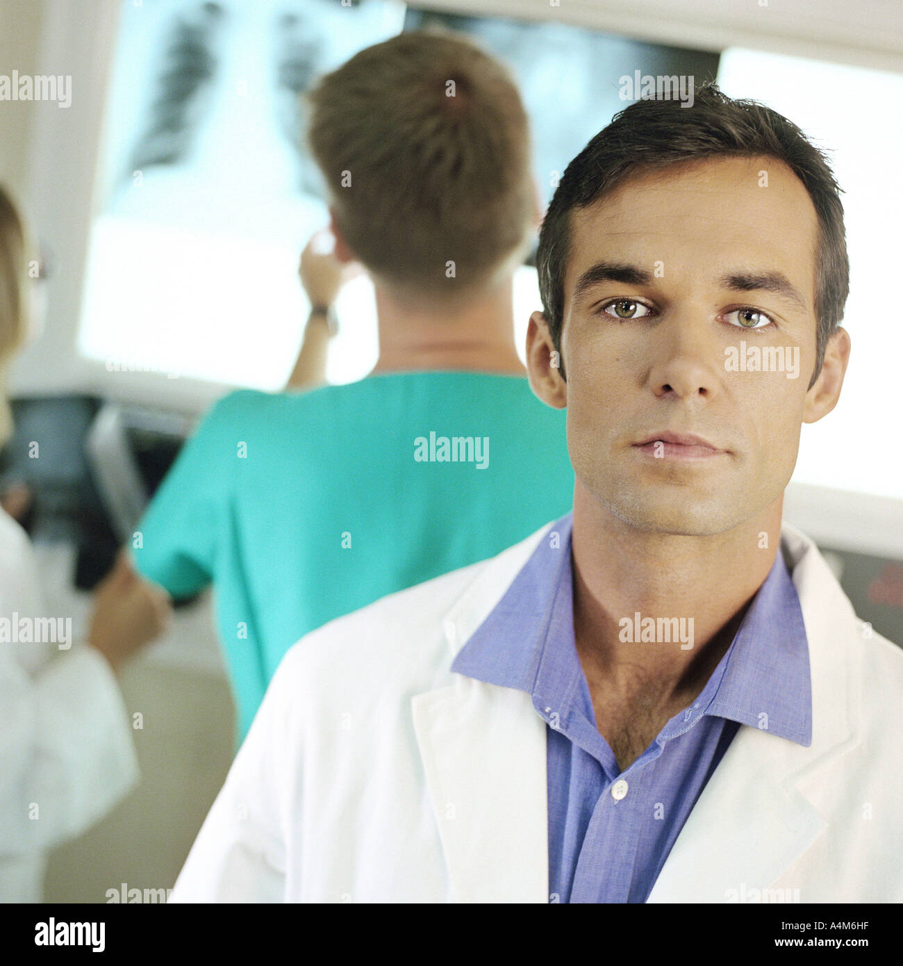 Doctors in x-ray lab Stock Photo - Alamy