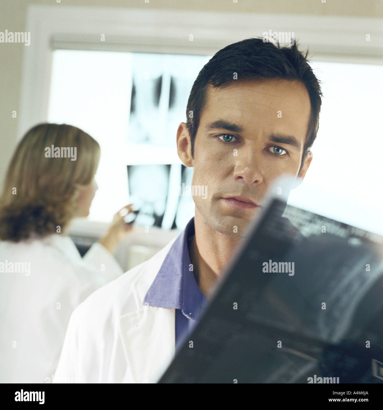 Doctors in x-ray lab Stock Photo - Alamy