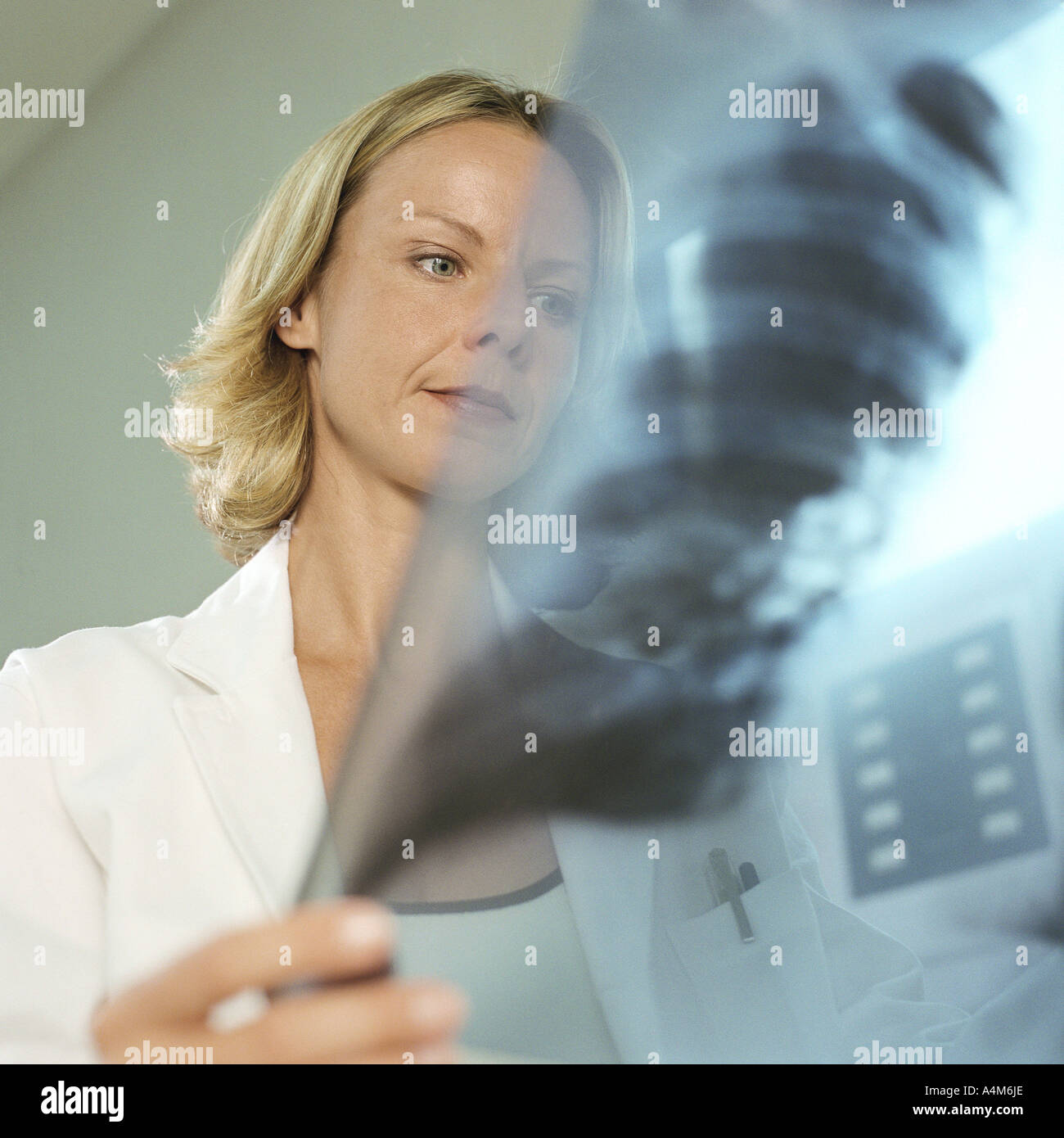 Female doctor in x-ray lab Stock Photo