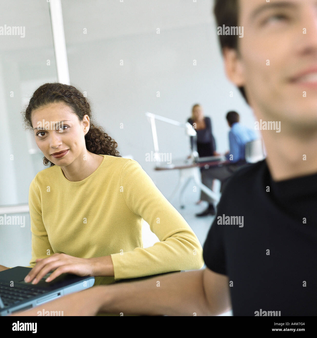 Casually dressed people working in office Stock Photo