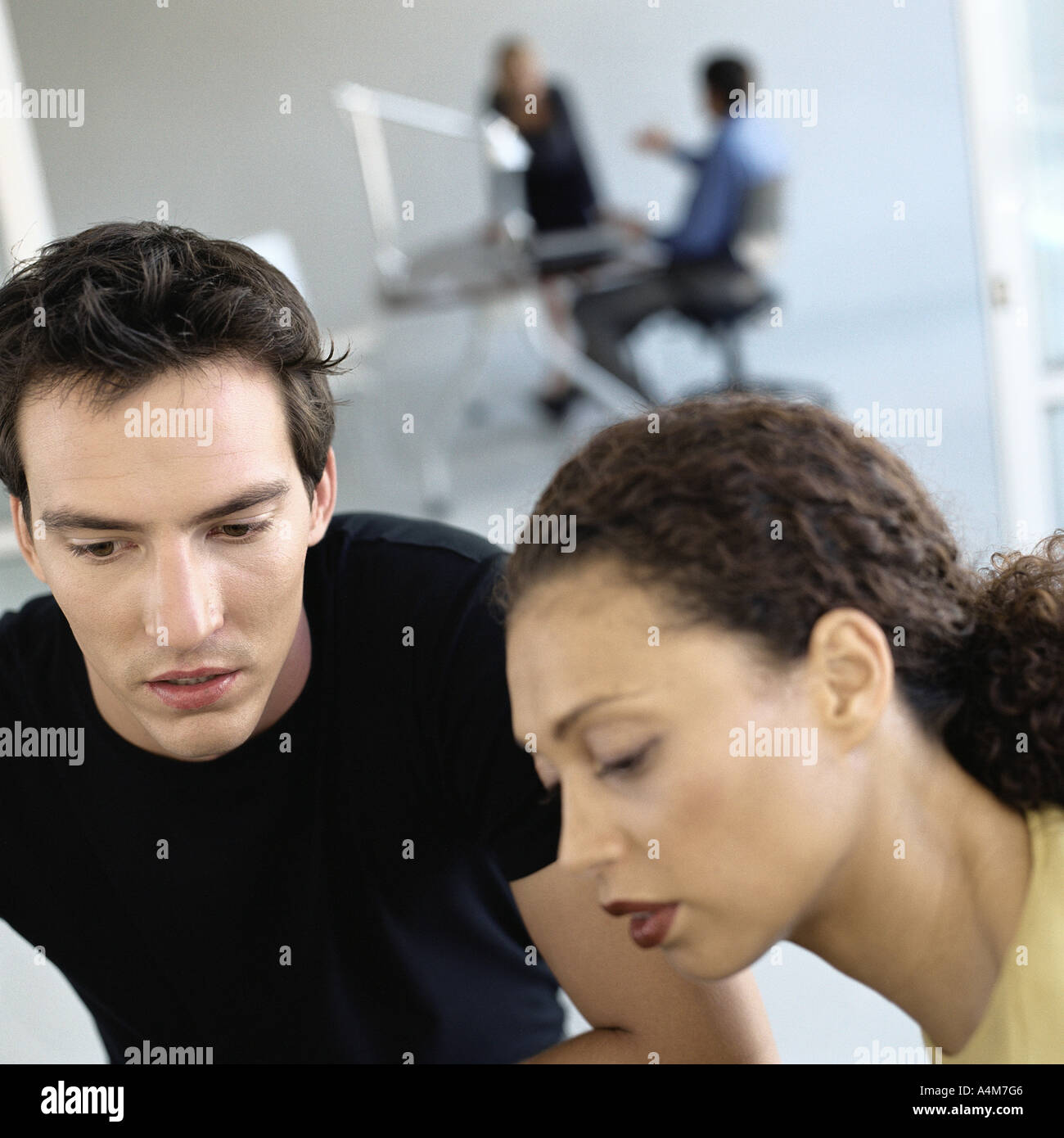 Casually dressed people working in office Stock Photo