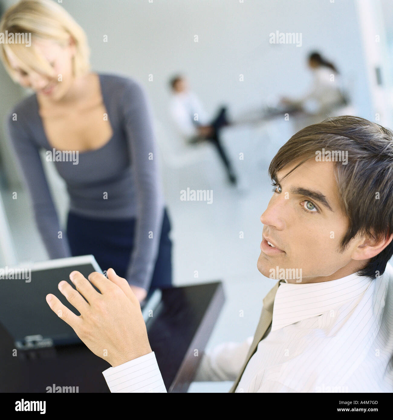 Businesspeople in office Stock Photo