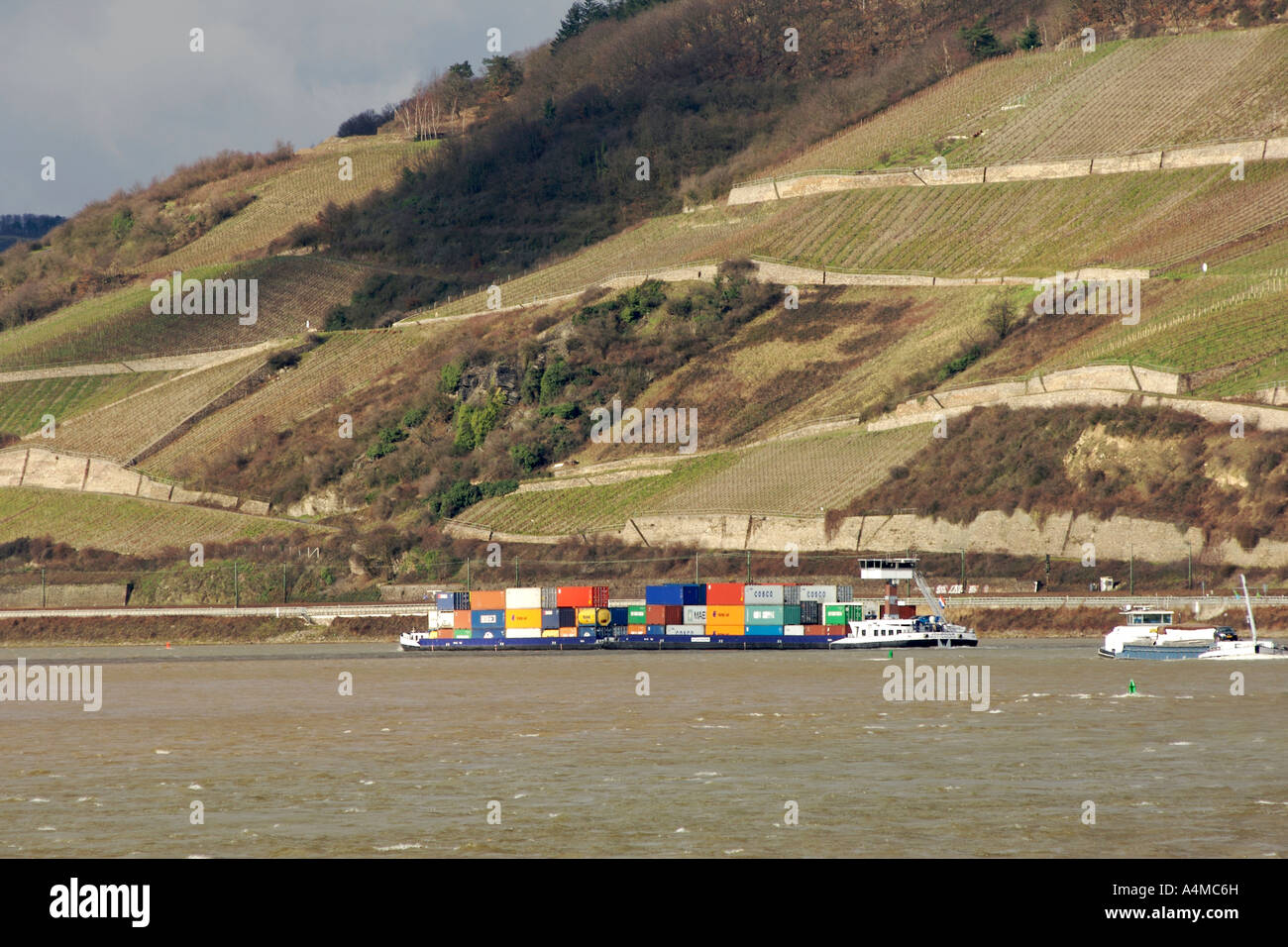 Container ship on the Rhine river in Germany's Hessen Province. Stock Photo