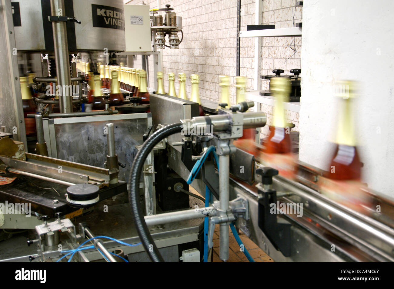Bottling machinery in the Carl Jung winery in Schloss Boosenburg in Rüdesheim am Rhine in the Hessen Province in Germany. Stock Photo