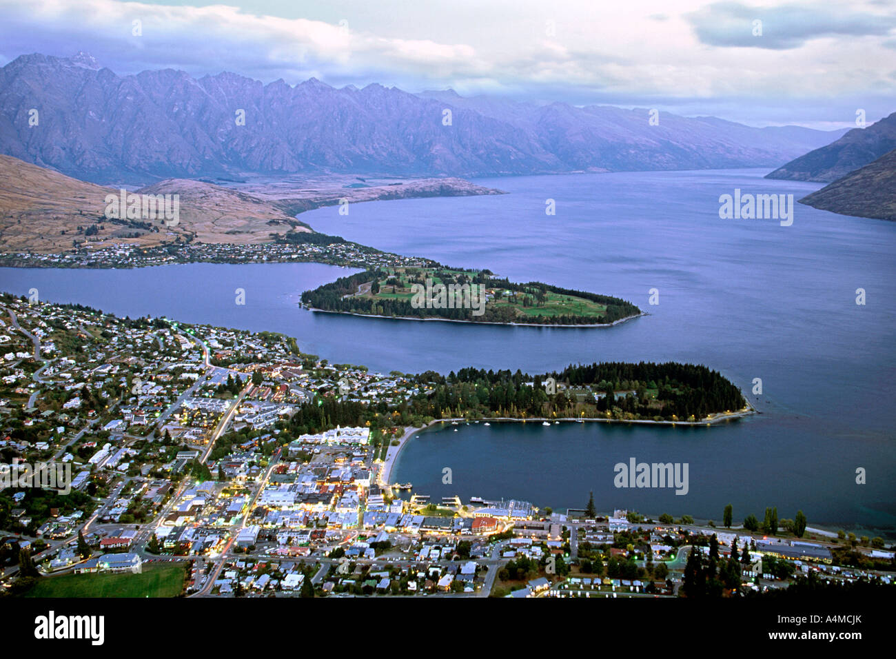 A view of Queenstown and Lake Wakatipu on New Zealand's south island ...