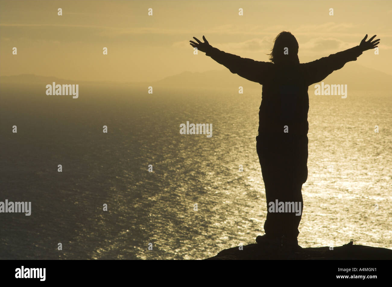 Person at mountain top hi-res stock photography and images - Alamy